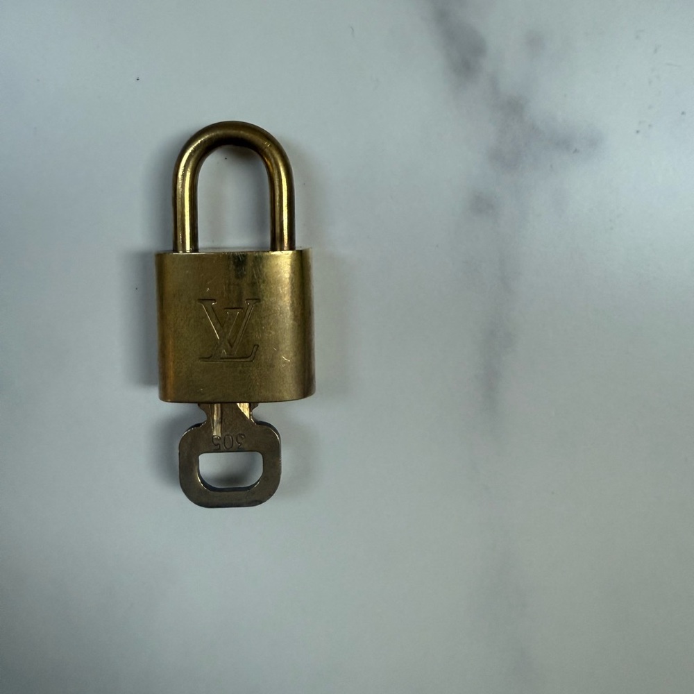 Louis Vuitton Gold Lock with Key